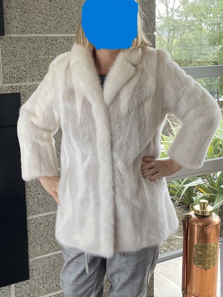 White Mink Coat Carousel 1