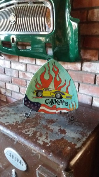 Hand painted Chevrolet corvette plate with stand. Carousel 7
