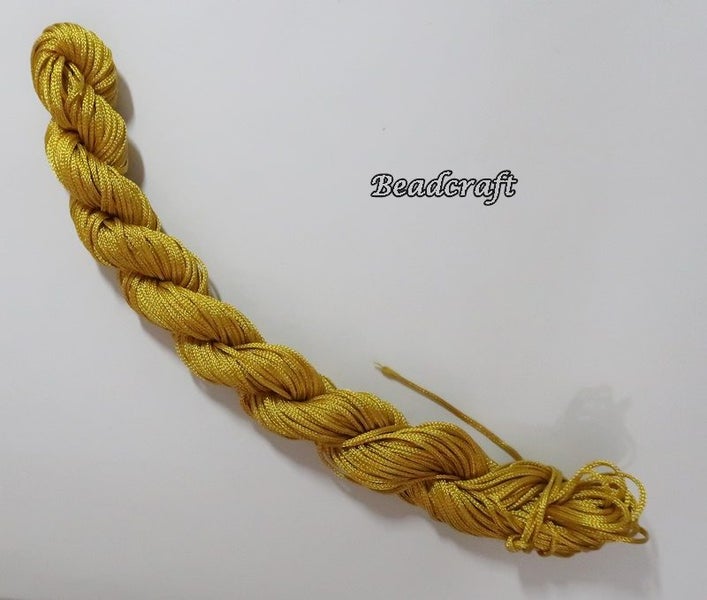 *$1.50 SALE* A 24 mtr. HANK of OLD GOLD NYLON CORD 1mm - COMBINE SHIPPING Carousel 1