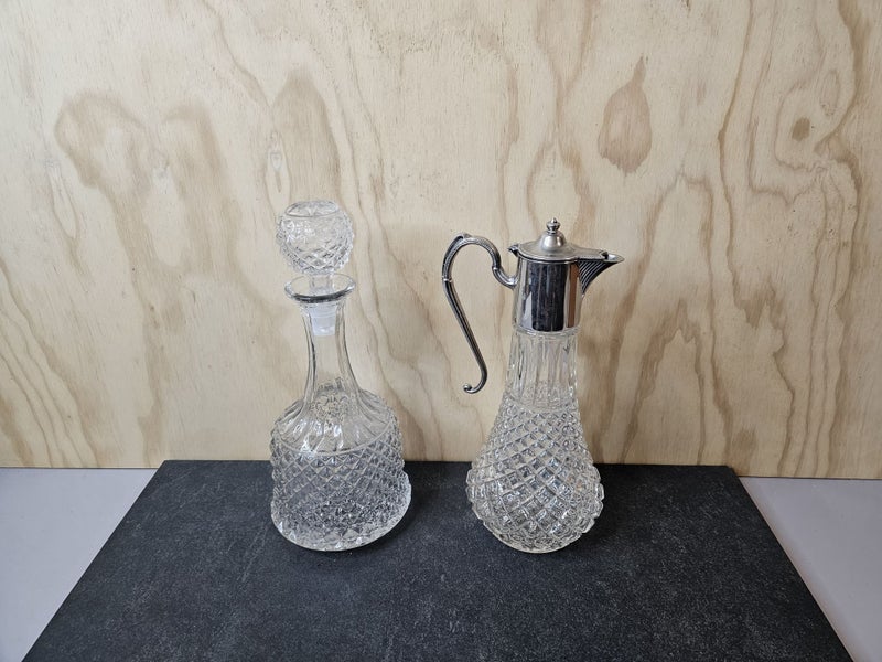 A handsome pair. One crystal decanter & one crystal claret jug with silver plate62863856052353111