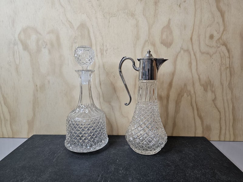 A handsome pair. One crystal decanter & one crystal claret jug with silver plate62863856052353112