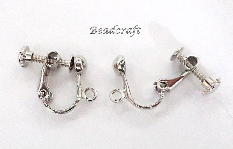 A PAIR of SILVER SCREW-ON EARRINGS Carousel 1