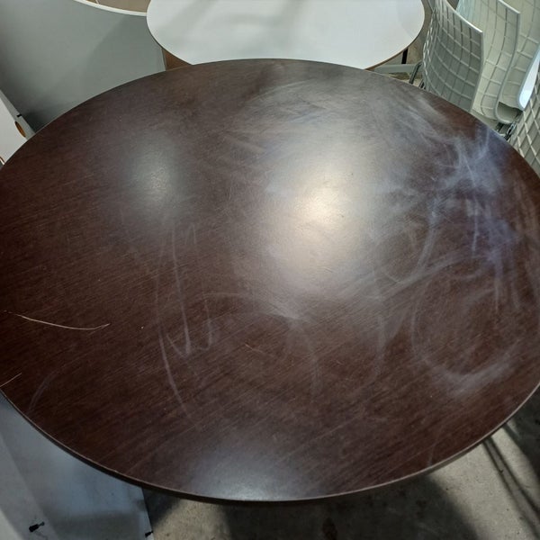 Brown round table Carousel 1