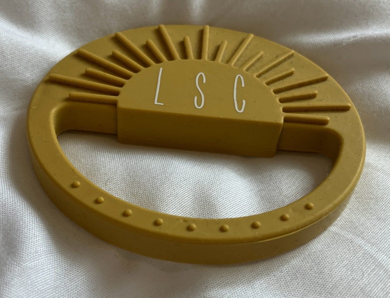 Sunrise silicone teether, turmeric, Little Sandy Co - NZ brand Carousel 1