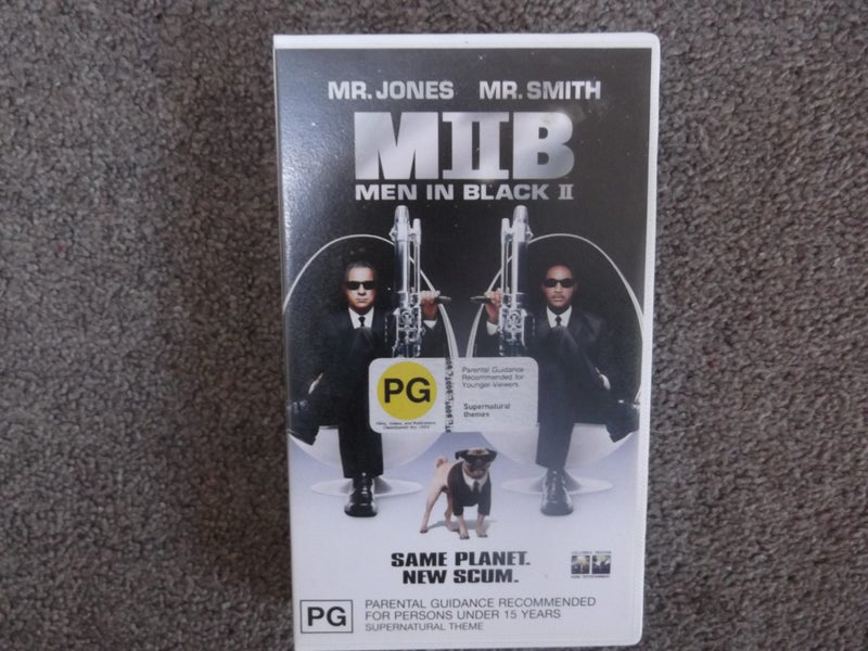 Men in Black II with Will Smith and Tommy Lee Jones or another Will S film - VHS Carousel 1