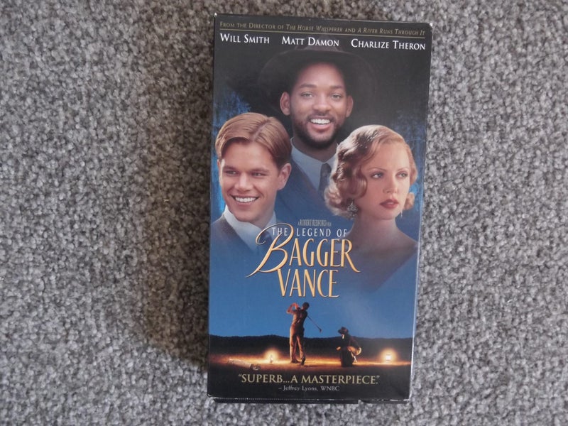 Men in Black II with Will Smith and Tommy Lee Jones or another Will S film - VHS Carousel 2
