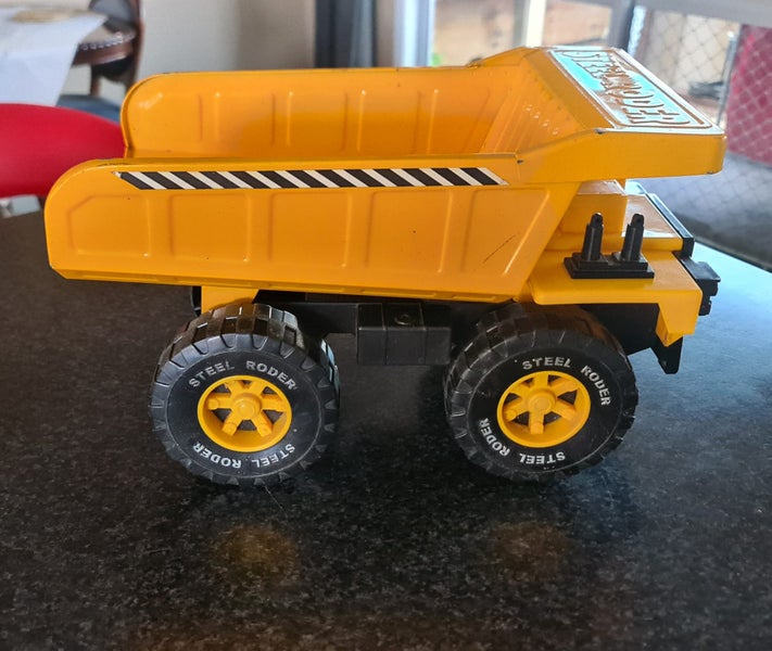 Old Vintage Tin Rodder Dump Truck Carousel 1