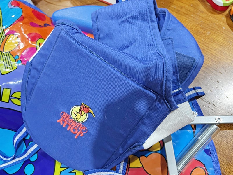 Jolly Jumper with Musical Mat Carousel 6