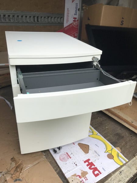 White Metal Underdesk Mobile With Key. Carousel 2