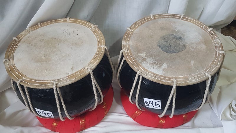 2 tablas . wooden. sound good. well made. c/w coils. different tones each drum Carousel 1