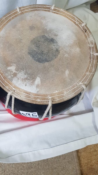 2 tablas . wooden. sound good. well made. c/w coils. different tones each drum Carousel 2