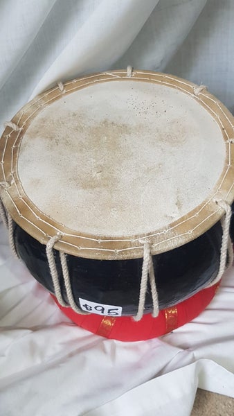 2 tablas . wooden. sound good. well made. c/w coils. different tones each drum Carousel 8