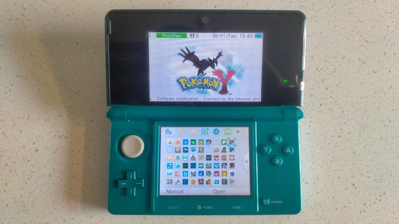 Sold Teal 3DS Full of games Connects to internet 64GB SD card