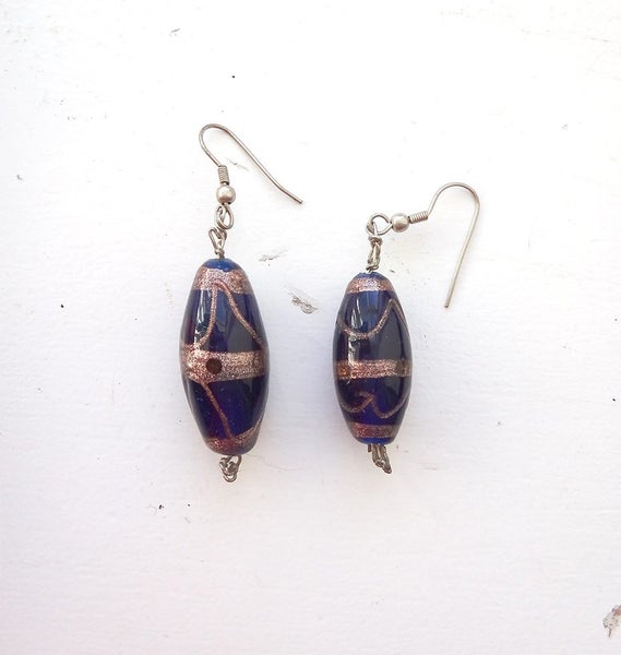 blue glass beads with golden lines pattern earrings Carousel 1