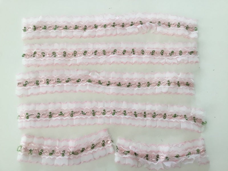 Pink & white floral nylon trim Carousel 1