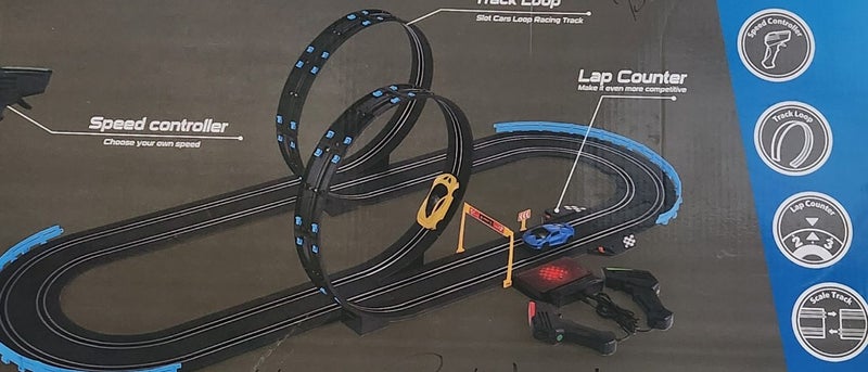 Super loop slot car set near new Carousel 2