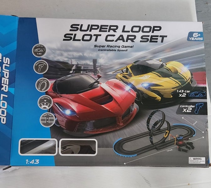 Super loop slot car set near new Carousel 1