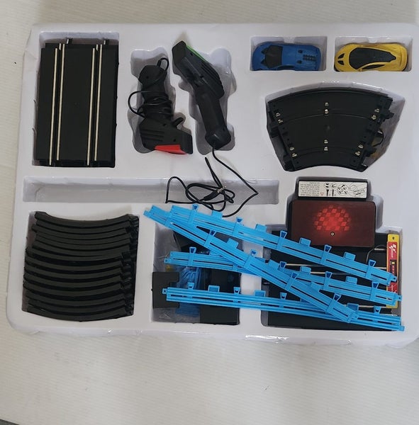 Super loop slot car set near new Carousel 3