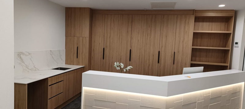 Woodgrain Reception - Kitchen Cabinet,bench top design and installation Carousel 1