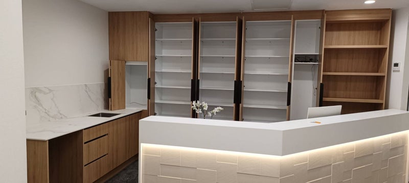 Woodgrain Reception - Kitchen Cabinet,bench top design and installation Carousel 2