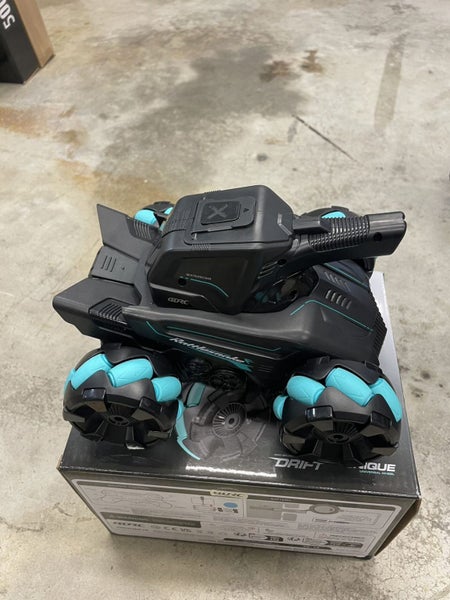 4WD Gesture Control RC Tank | Water Bomb Spray, 15km/h Speed | 2.4GHz Remote Carousel 2