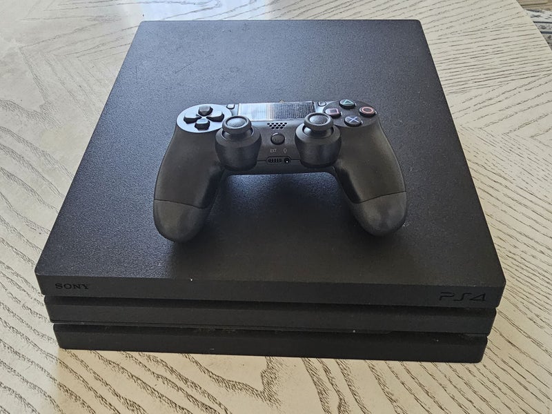 Sony PS4 PRO 1TB Console and Wireless Controller Carousel 1
