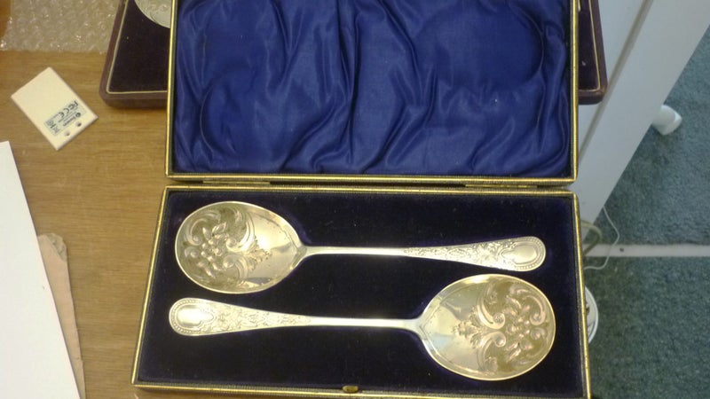 PAIR OF ANTIQUE DECORATIVE SILVER SERVING SPOONS Carousel 1