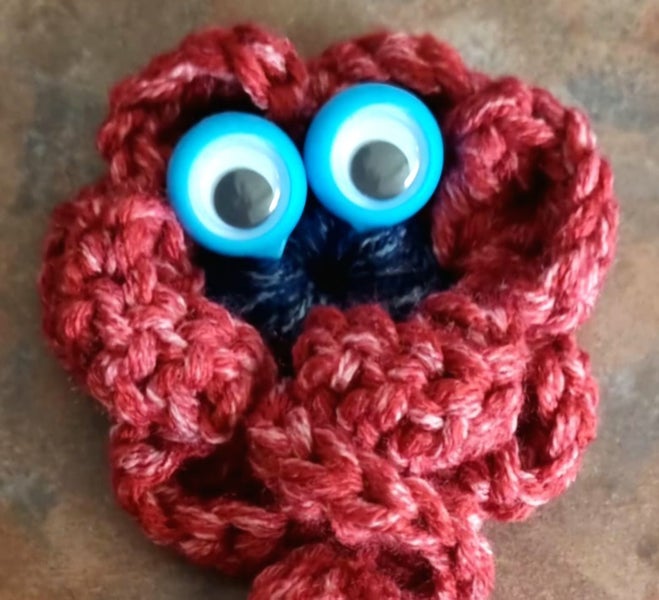 Crochet googly eyes fidget toy Carousel 1