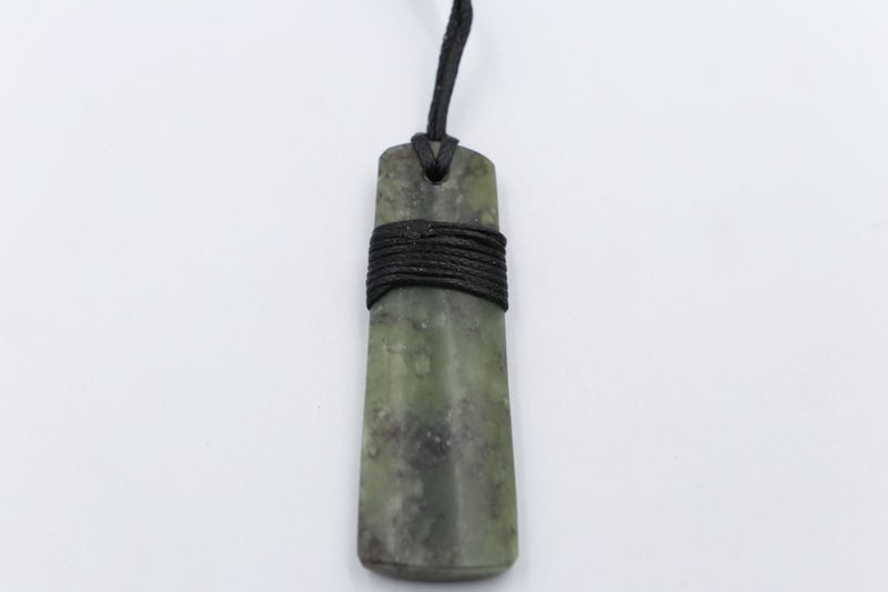 New Zealand Greenstone Wrapped Toki Carousel 2