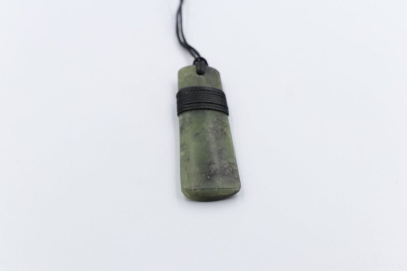 New Zealand Greenstone Wrapped Toki Carousel 6
