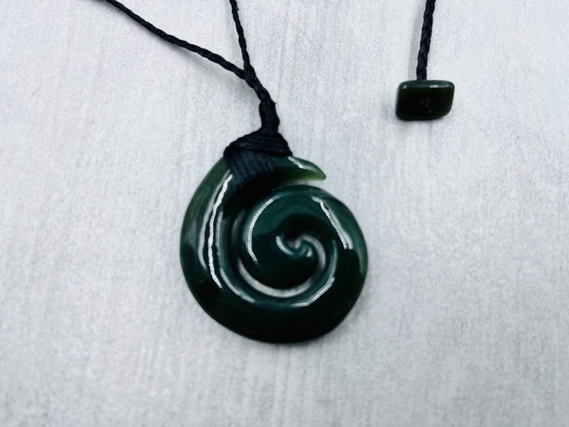 Lashed Greenstone Koru Padent Plaited Cord 42mm NH062 Carousel 1