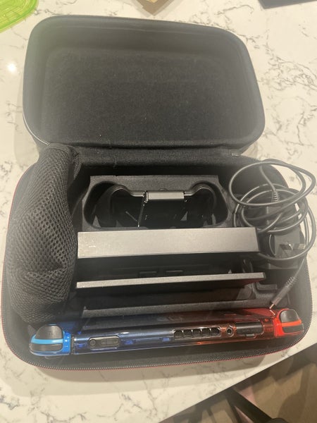Nintendo Switch and case Carousel 1