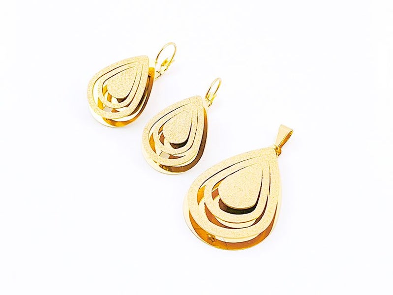 Shimmering Gold-Plated Earrings and Pendant Set Carousel 1