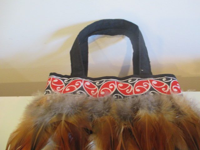 FEATHER MAORI KOROWAI HANDBAG Carousel 2