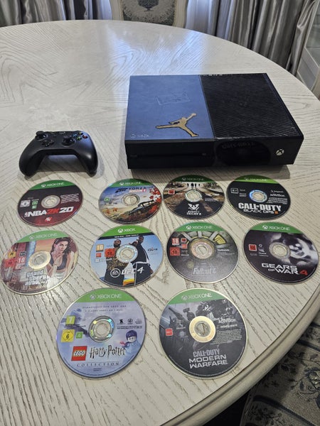 Xbox One Console 1TB and 10x Games Carousel 1