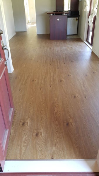 8mm Laminate flooring $16.95/m2incl gst - Honey Oak Carousel 4
