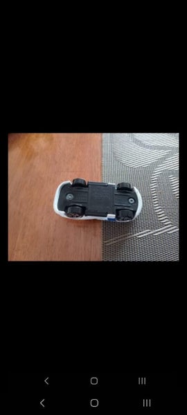 Volkner Expandable Mobil Bus 1:50 by Siku with free Hot Wheels model. Carousel 17