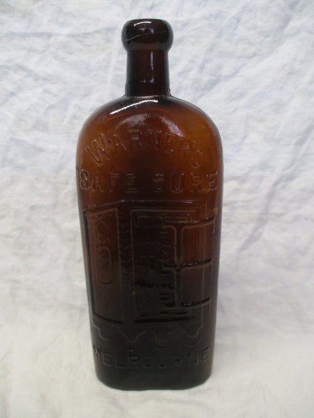 SH 384 Old Chemist Bottle - Warner's Safe Cure - Melbourne Carousel 1