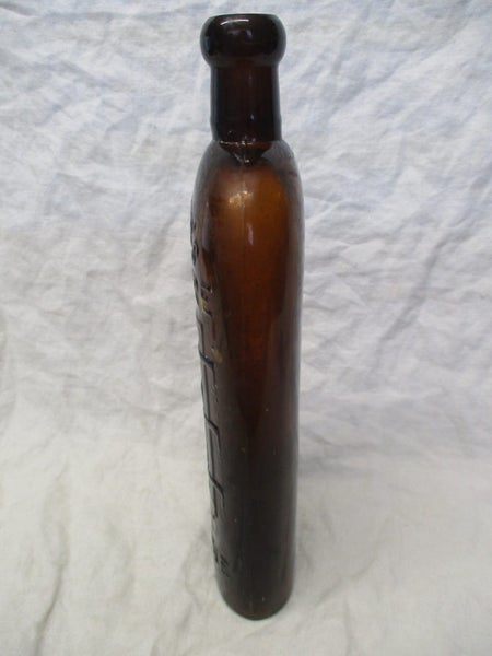 SH 384 Old Chemist Bottle - Warner's Safe Cure - Melbourne Carousel 2