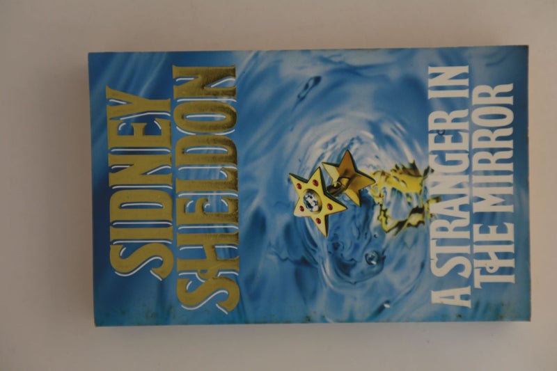 A Stranger in the Mirror by Sidney Sheldon64182258930690110