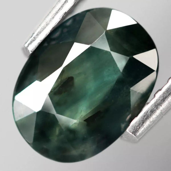 1.04Ct. Normal Heated Gemstone Sapphire Greenish Blue Oval. Carousel 1