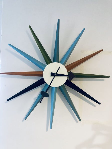 Nelson Sunburst clock Carousel 1