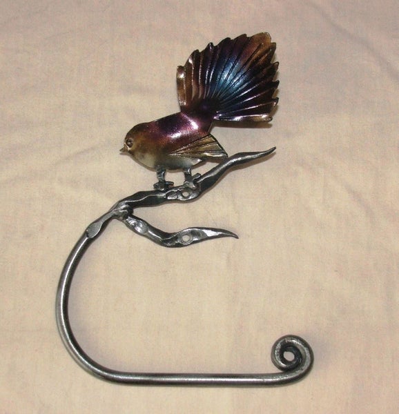 Hand forged fantail towel or toilet roll holder forged by blacksmith Carousel 2