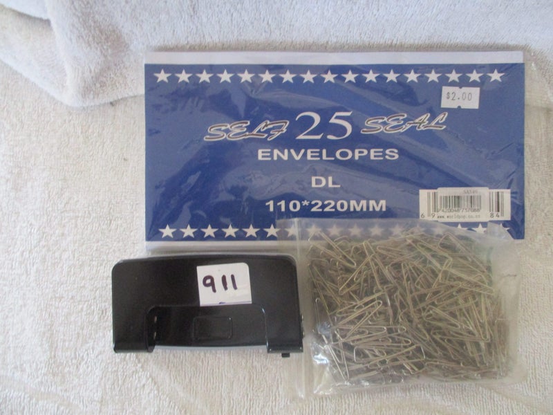 Stationery 2-hole Punch. 25 envelopes. bag paper clips Carousel 1