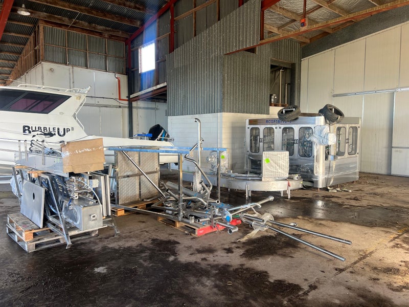 3-in-1 Washing, Filling, and Capping Machine for Glass/PET Bottles Hot / Cold Carousel 11
