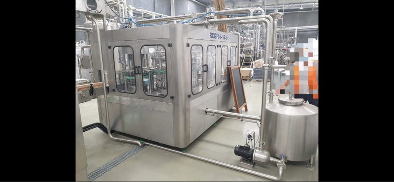 3-in-1 Washing, Filling, and Capping Machine for Glass/PET Bottles Hot / Cold Carousel 1