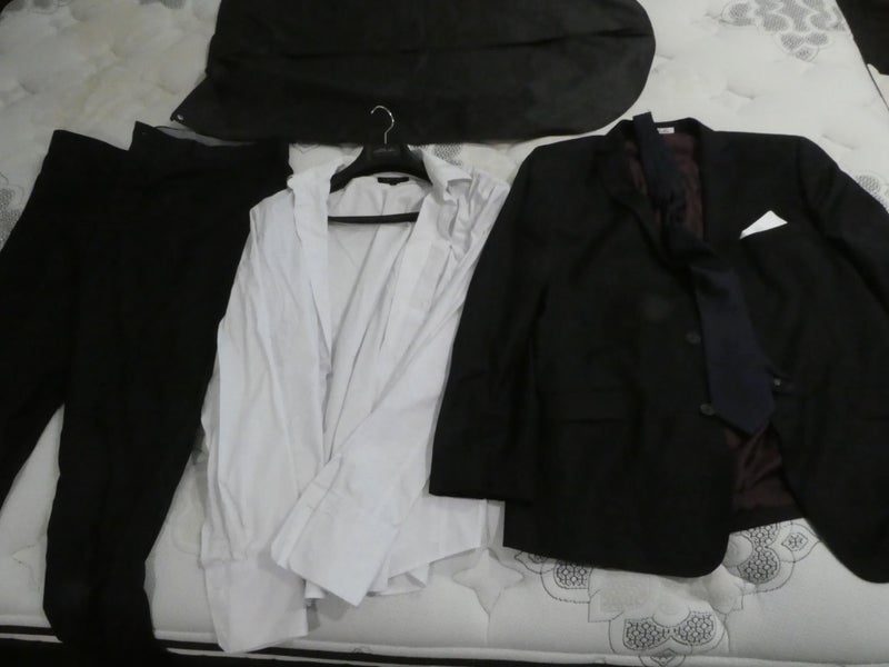 Almost new Black mens Suit. Worn once. Carousel 1
