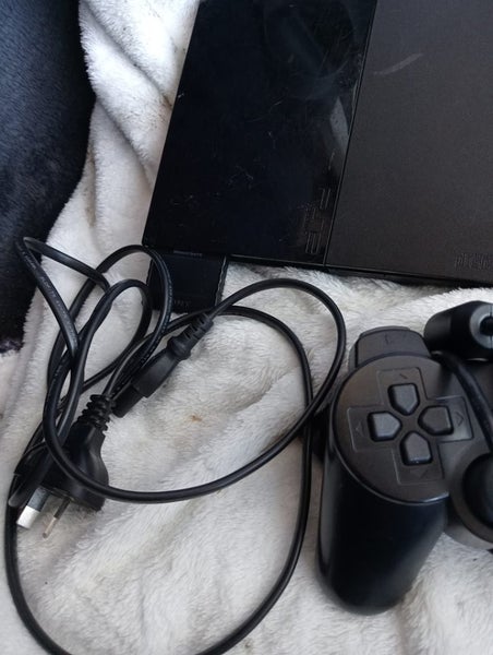 PlayStation 2 console plus controller Carousel 1