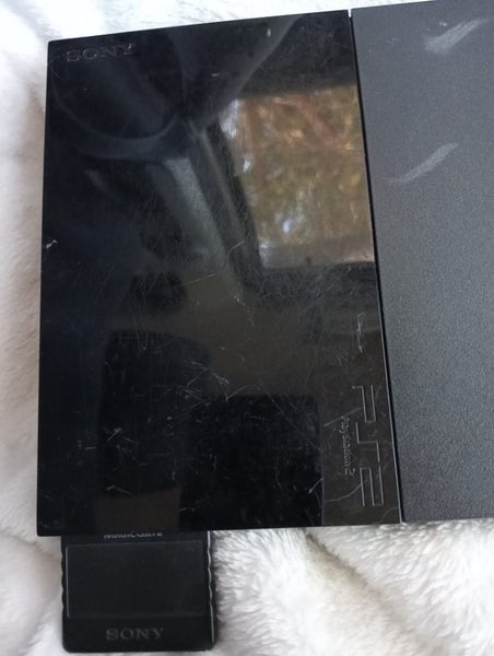 PlayStation 2 console plus controller Carousel 11