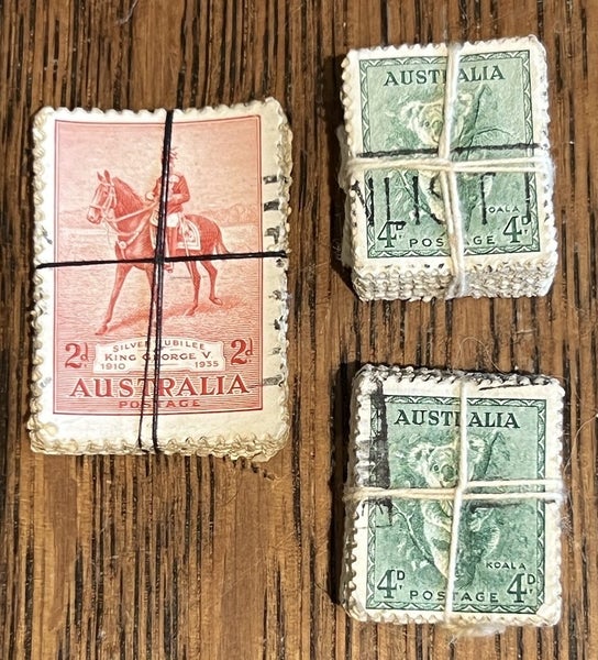Three bundles of used, vintage Australian stamps, tied up with cotton thread Carousel 1